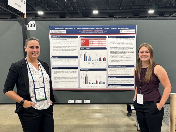 Alexis Henderson and her mentor, Dr. Kristen Renner, stand next to Alexis' poster at the 2023 American College of Sports Medicine Meeting 