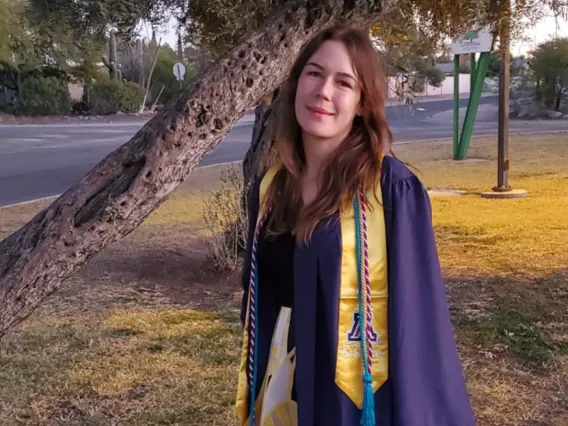 Picture of Caroline Coppinger in graduation gown