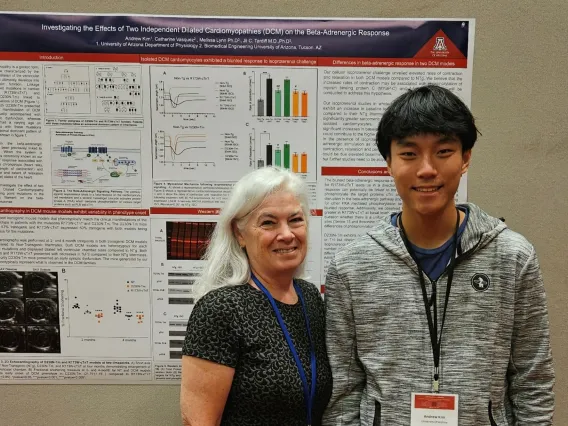 Picture of Andrew Kim and Jil Tardiff standing in front of Andrew's poster