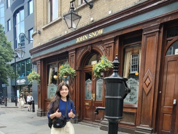 Picture of Ariel standing in front of the Broad Street Pump