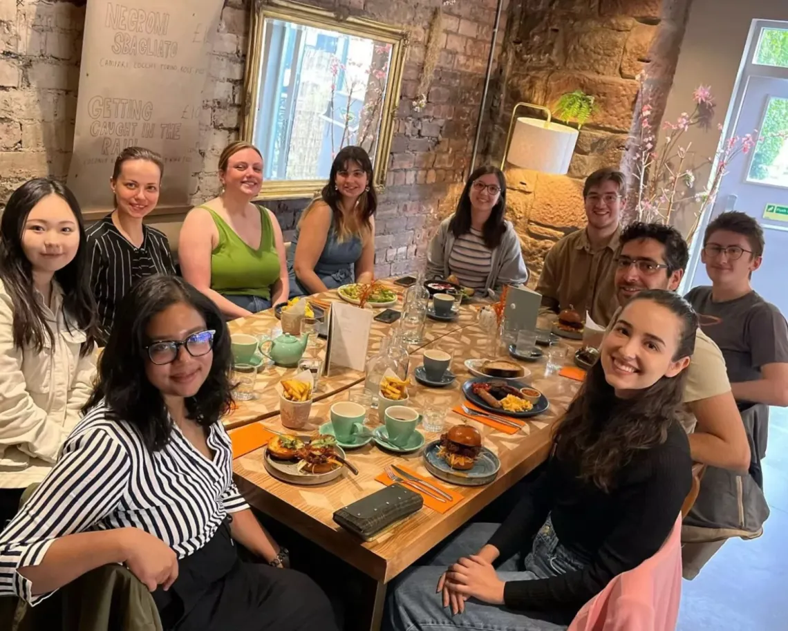 Picture of Chloe Park and members of the Sheiner and Harding labs eating lunch together