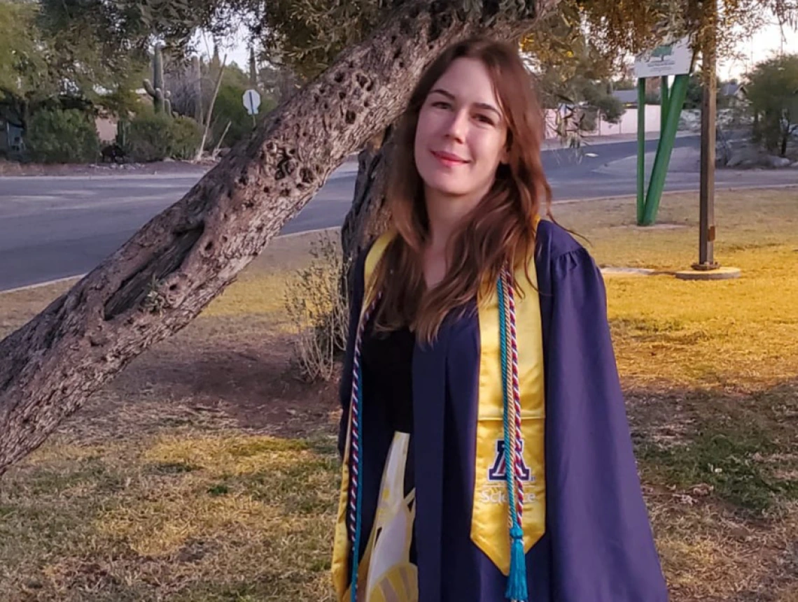 Picture of Caroline Coppinger in graduation gown