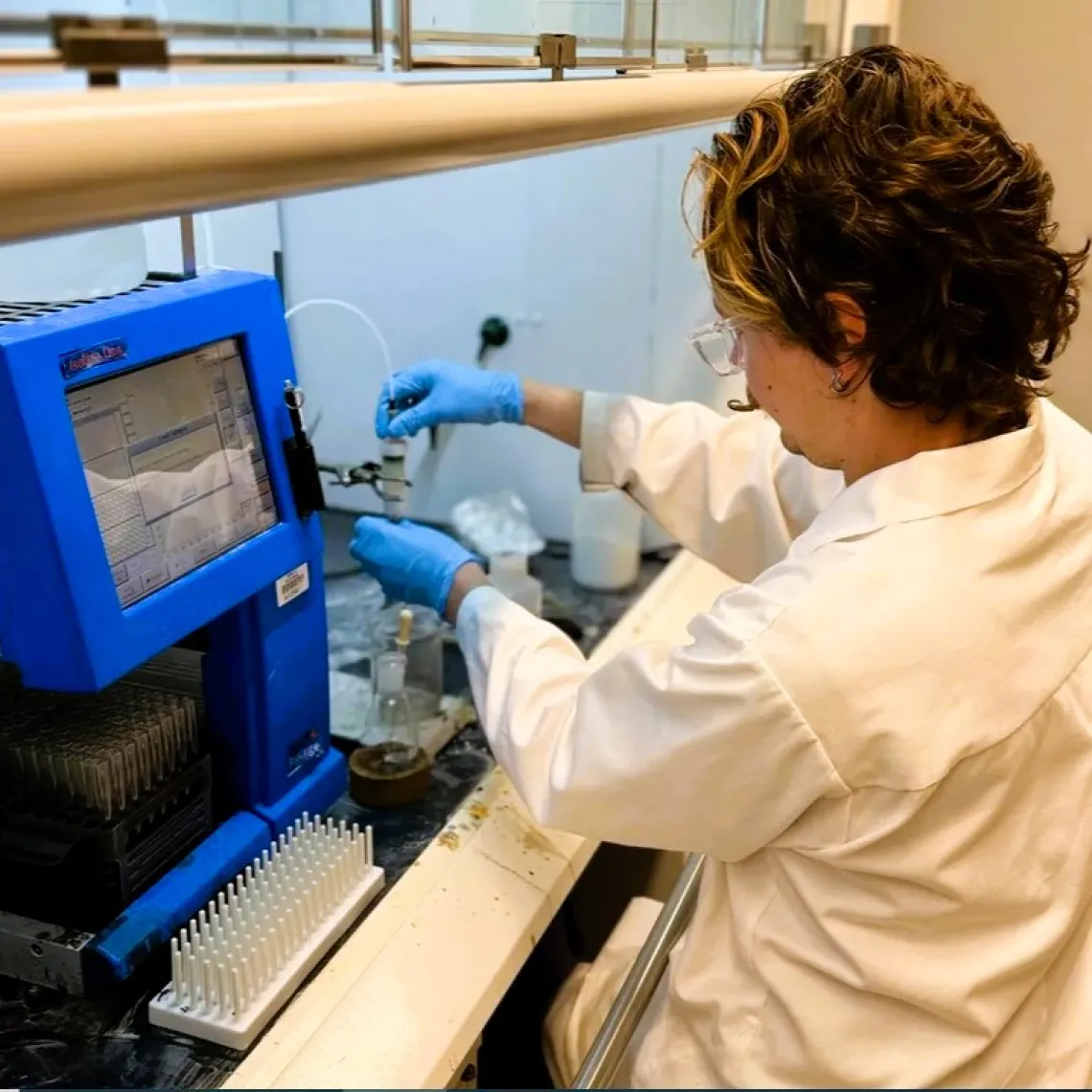 A picture of Jake conducting an experiment at a lab bench