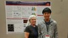 Picture of Andrew Kim and Jil Tardiff standing in front of Andrew's poster